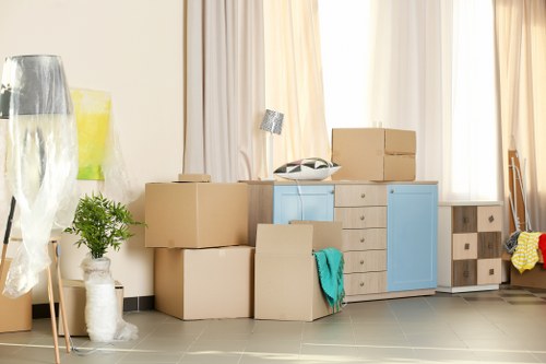 Packing boxes and moving supplies prepared for a Canary Wharf apartment move