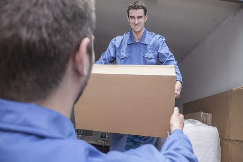 Removal team planning a Canary Wharf apartment move with access considerations