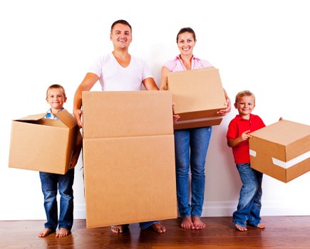 Packed student boxes ready for transport from a Canary Wharf apartment