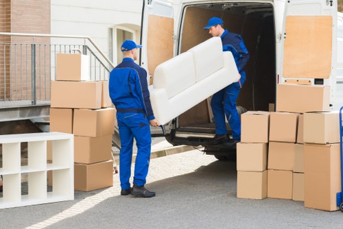 Movers team preparing items for a house move