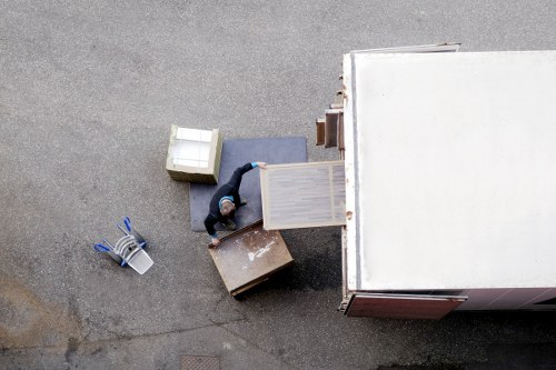 Packed office furniture and IT equipment ready for relocation