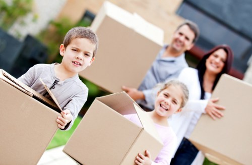 Packed boxes and furniture ready for a Canary Wharf flat removal