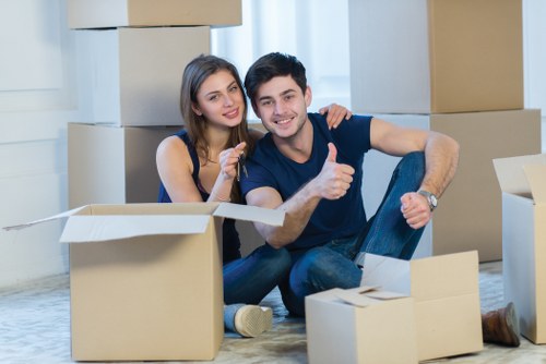 Careful loading of student belongings for a Canary Wharf relocation