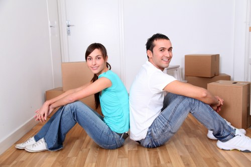 Packed household boxes ready for house removals in Canary Wharf