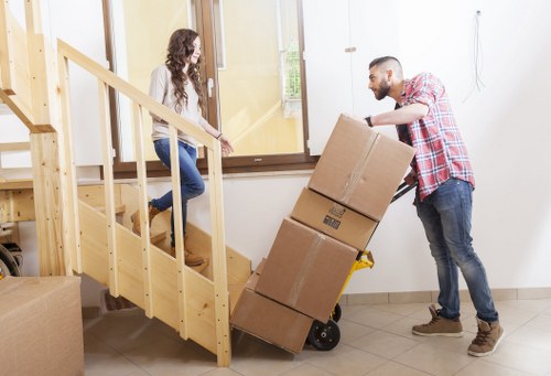 Careful furniture handling during a Canary Wharf home removal