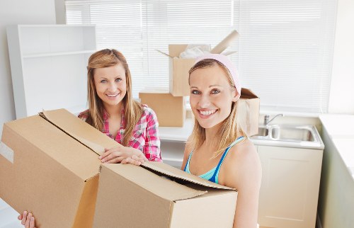 Checklist and moving boxes prepared for a Canary Wharf house move